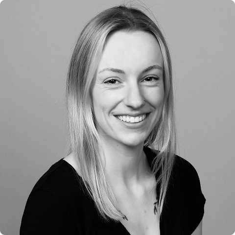 Black and white headshot of Kelly Hilbert